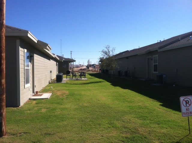 Lawn between the Santa Rita Homes apartment buildings